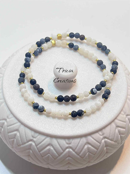 Duo de bracelets : gris noir et blanc